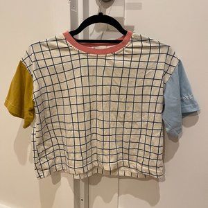 Colorful geometric tee from Kina and Tam